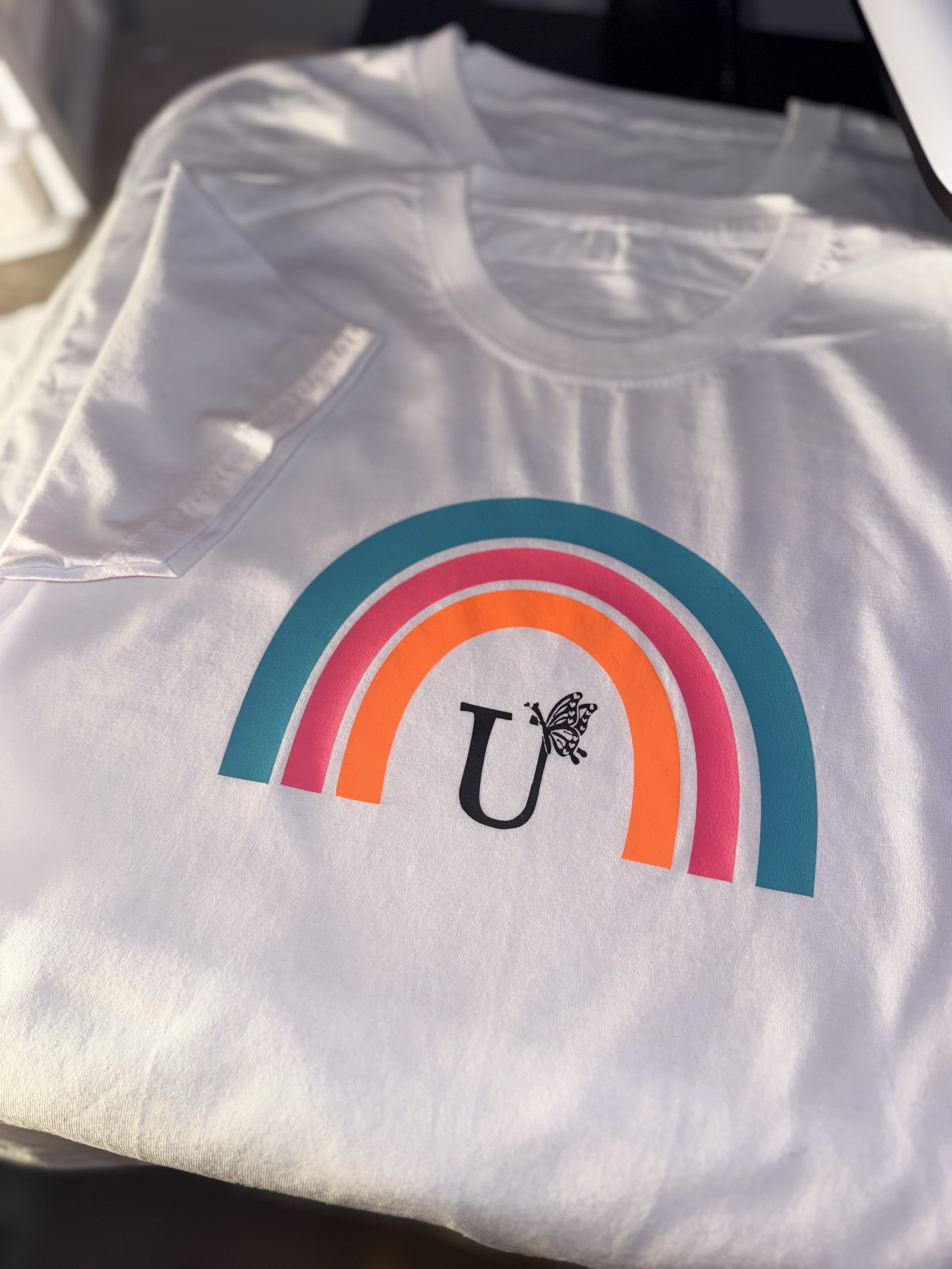 Kids rainbow t-shirt - personalised with their initial.